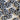 Pattern of blue and white buttons with whale design on a beige background
