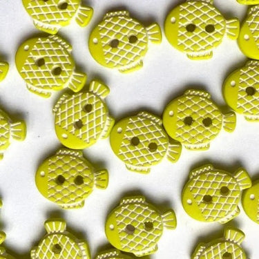 Yellow fish-shaped objects on a white background