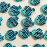 Blue fish-shaped cookies on a light background