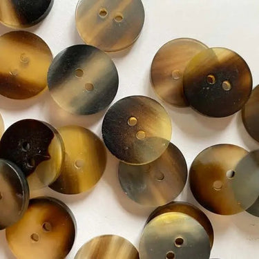 18mm Natural Horn Button (J4) with unique color variations and natural patterns, perfect for sewing and crafting projects.
