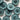 Multiple blue buttons with four holes on a light background