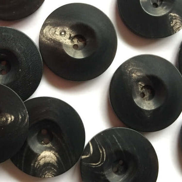 25mm Black Horn buttons with natural markings (J7) arranged in view showing unique natural designs, perfect for garment detail.