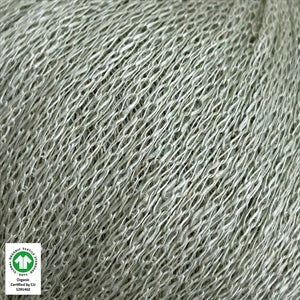 Close-up of Løvetand organic linen yarn by CaMaRose, ideal for summer knitwear and crochet, featuring a chainette texture in light grey.