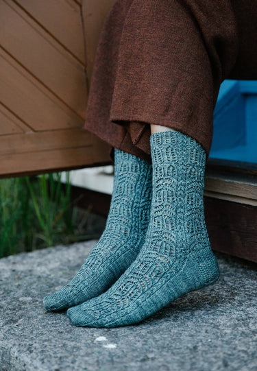 Laine | 52 Weeks of Socks | Ultimate Sock Pattern Book, , Discover 52 sock patterns by 46 designers in Laine’s iconic hardcover. A must-have for sock knitters seeking inspiration, challenge, and timeless style., Knit With Me