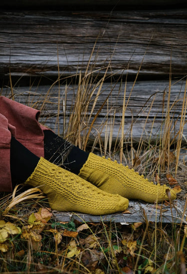 Laine | 52 Weeks of Socks | Ultimate Sock Pattern Book, , Discover 52 sock patterns by 46 designers in Laine’s iconic hardcover. A must-have for sock knitters seeking inspiration, challenge, and timeless style., Knit With Me