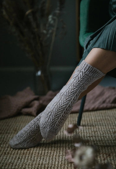 Laine | 52 Weeks of Socks | Ultimate Sock Pattern Book, , Discover 52 sock patterns by 46 designers in Laine’s iconic hardcover. A must-have for sock knitters seeking inspiration, challenge, and timeless style., Knit With Me