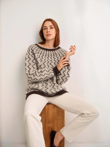 Model wearing a knitted sweater from the 52 Weeks of Sweaters book collection, available for pre-order.