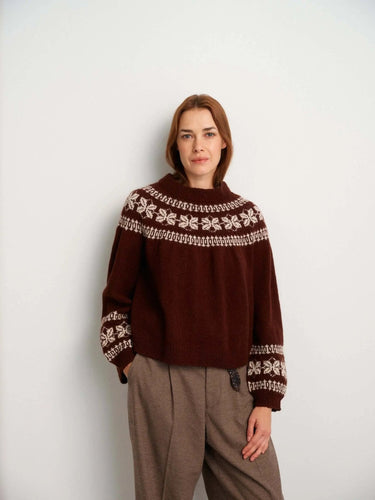 Woman wearing a brown knitted sweater from 52 Weeks of Sweaters collection