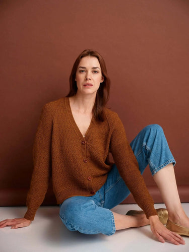 Model wearing a knitted sweater featured in 52 Weeks of Sweaters book, available for pre-order.
