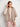 Woman wearing a knitted sweater from the book '52 Weeks of Sweaters', now available for pre-order with publication in February 2026.