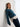 Woman wearing a blue sweater featured in 52 Weeks of Sweaters book for pre-order