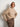 Model wearing a cozy knit sweater from 52 Weeks of Sweaters pre-order collection.