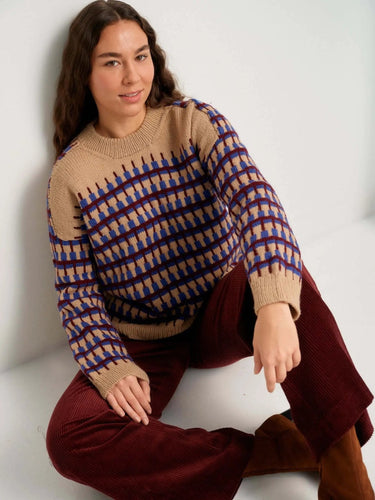 Person wearing a patterned sweater from 52 Weeks of Sweaters collection, available for pre-order