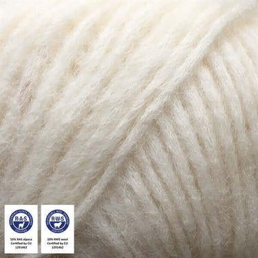 Snefnug yarn close-up showcasing texture with RAS and RWS certifications