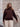 Model wearing knit sweater for Aleks Byrd - Meet & Greet, Book Signing (BOOK INCLUDED) and Trunk Show with Aleks Byrd event.