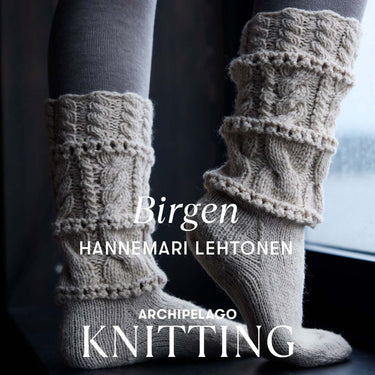 Archipelago Knitting cozy leg warmers showcasing intricate patterns and cable designs, available for pre-order now.
