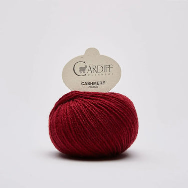 Cardiff Cashmere yarn ball in red, part of the Sophie Scarf Kit.