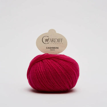 Cardiff Cashmere Classic yarn in vibrant pink for Sophie Scarf Kit knitting project.