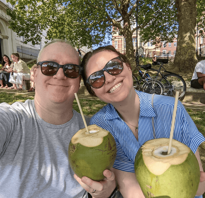 Picture of knitting shop owner Carol Wheeler enjoying a drink