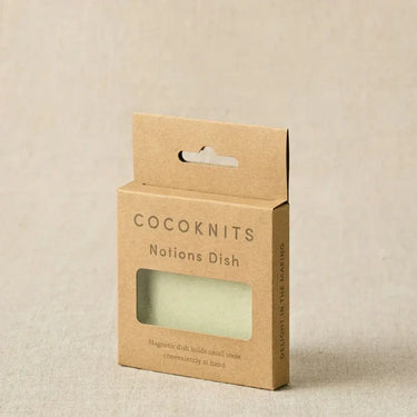 Packaging of Cocoknits Magnetic Notions Dish for organizing small metal notions like stitch markers and sewing needles.
