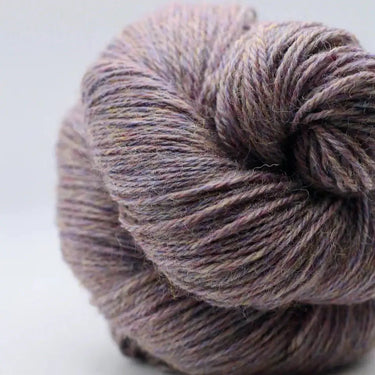 Yarnadelic Sport yarn of 100% Falklands Corriedale wool showcasing its soft texture and unique color blend.