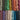 Colorful skeins of Yarnadelic Sport yarn in various shades, made from 100% Falklands Corriedale wool. Ideal for knitting and crafting.