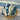 Yarn Advent Calendar featuring blue and white mini skeins on a bamboo plate with ocean-themed background.
