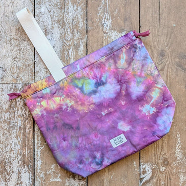 Ice Dyed Project Bags - XLarge, purple and multicolor, made from unique ice dyed cotton by Jose Rose, on a wooden floor