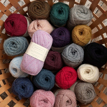 Le Petit Lambswool | Biches and Buches, colour: Dark Gold, The lambswool blend provides the perfect balance of structure and drape. This fingering-weight yarn is a Scottish lambswool with tweed yarn speckles. , Knit With Me