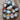 Marie Wallin British Breeds Aran yarn collection in 12 colors, made from 100% wool of British sheep breeds, 50g balls displayed.
