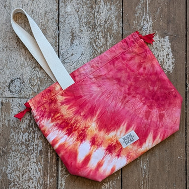 Ice Dyed Project Bags - Large in vibrant red and orange tones, featuring a durable strap and spacious design for craft projects.