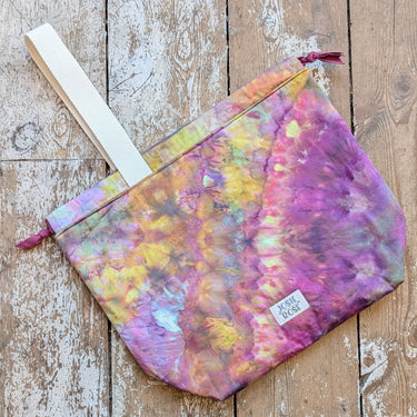 Ice Dyed Project Bags - XLarge with colorful patterns on wood background, showcasing unique design and storage features.