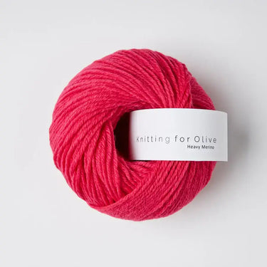Knitting for Olive Heavy Merino yarn ball in vibrant red made from 100% Merino wool, soft and natural texture, sourced from New Zealand.