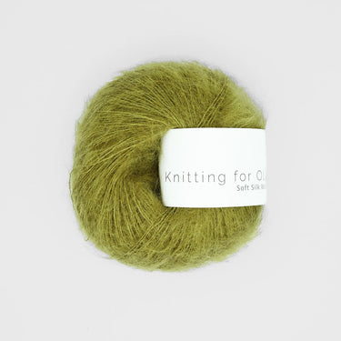 Knitting For Olive Soft Silk Mohair yarn ball in green, luxurious blend of Kid Mohair and Mulberry silk, ideal for knitting projects.
