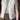 Person wearing a light gray knitted vest over a gray shirt with brown pants.