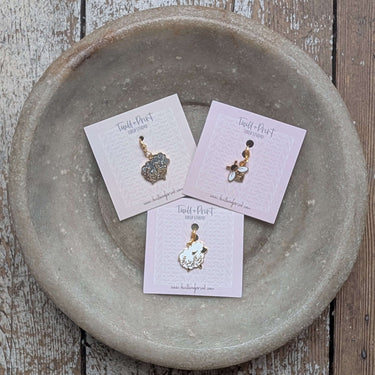 Twill + Print Progress Keepers displayed in a dish bowl, ideal for knitting and crochet tracking.