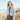 Woman wearing knit sweater from Aran by Marie Wallin on beach