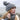 Woman wearing Skar Scarf and chunky knit beanie by Janita Koskinen at the beach.