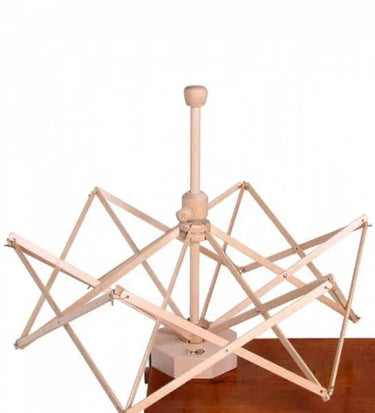 Ashford Umbrella Swift, , Why not pair you Ashford Ball Winder with the gorgeous Ashford Umbrella Swift. Our swift clamps to your table and is easily adjusted to hold a wide range of skein sizes ready for winding into balls. This swift has a smooth and qu