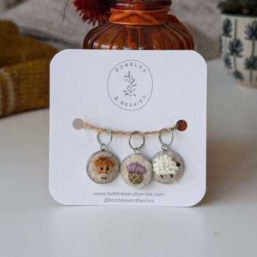 Bobbles & Berries | Stitch Marker Set | Hand-Embroidered Art, Style: Highland Friends, Discover Bobbles & Berries hand-embroidered stitch markers, inspired by Scottish nature. Lightweight, smooth, and perfect for mindful, snag-free knitting., Knit With Me
