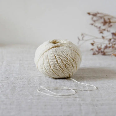 De Rerum Natura | Candide Yarn | Light Wool-Cotton Blend, Colour: Sucre Glace, De Rerum Natura Candide is a soft wool-cotton blend yarn, perfect for spring knits. Naturally dyed, eco-friendly, and ideal for textured stitches. Shop now!, Knit With Me