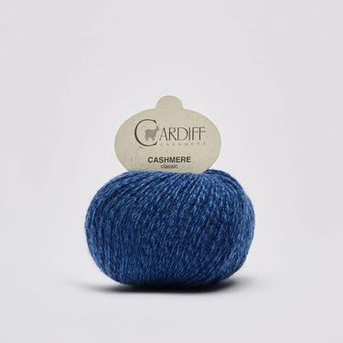Cardiff Cashmere Classic | Sport / DK Yarn yarn ball in 557 Blu Notte colour with simple background