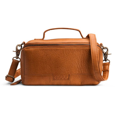 Brown leather bag from Muud in a white background