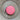 Pink Colourful Tape Measure in round case on textured surface