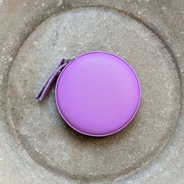 Colourful Tape Measure with retractable design and bright purple exterior, ideal for knitting and body measurements, by Fox & Pine Stitches.