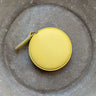 Yellow round Colourful Tape Measure with retractable mechanism, perfect for sewing and knitting projects, measures up to 150cm.