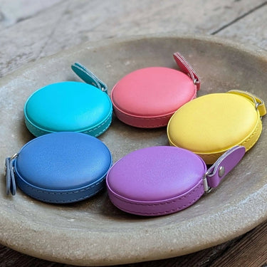 Colourful Tape Measure set by Fox & Pine Stitches in blue, pink, yellow, teal, and purple. Retractable, material, 150cm/60" length.