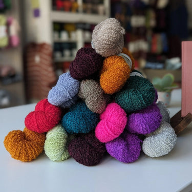 Wild Atlantic | Eriu | Super Soft Merino, Colour: Nebula, Ériu ("air-oo") is a super soft merino yarn. The boucle texture makes it incredibly versatile, allowing it to be a substitute yarn in patterns calling for DK or worsted weights, adding a beautiful