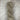 Wild Atlantic | Eriu | Super Soft Merino, Colour: Sandstone, Ériu ("air-oo") is a super soft merino yarn. The boucle texture makes it incredibly versatile, allowing it to be a substitute yarn in patterns calling for DK or worsted weights, adding a beautif