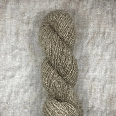 Wild Atlantic | Eriu | Super Soft Merino, Colour: Sandstone, Ériu ("air-oo") is a super soft merino yarn. The boucle texture makes it incredibly versatile, allowing it to be a substitute yarn in patterns calling for DK or worsted weights, adding a beautif